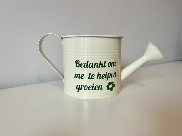 Witte gieter groene tekst